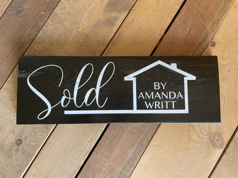 Sold by "realtor name" sign